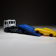 Illustration for article titled Makeitfit Monday: Isuzu Elf Vehicle Transporter by Tomica